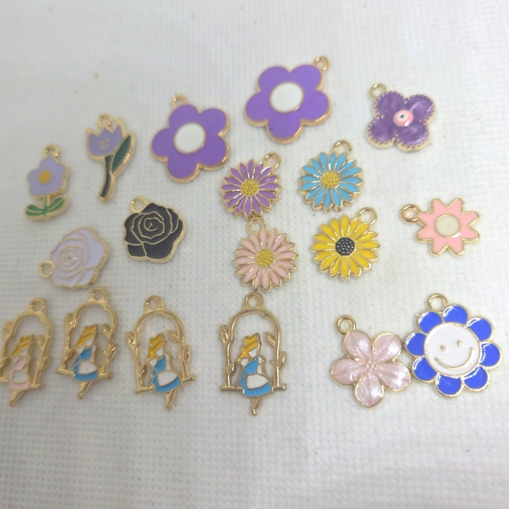 Colorful Flower and Character Charms.  18 Charms